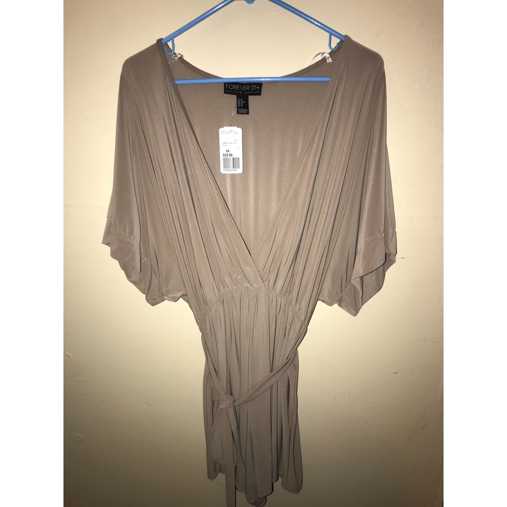 Romper. Brand new with tag, never worn.